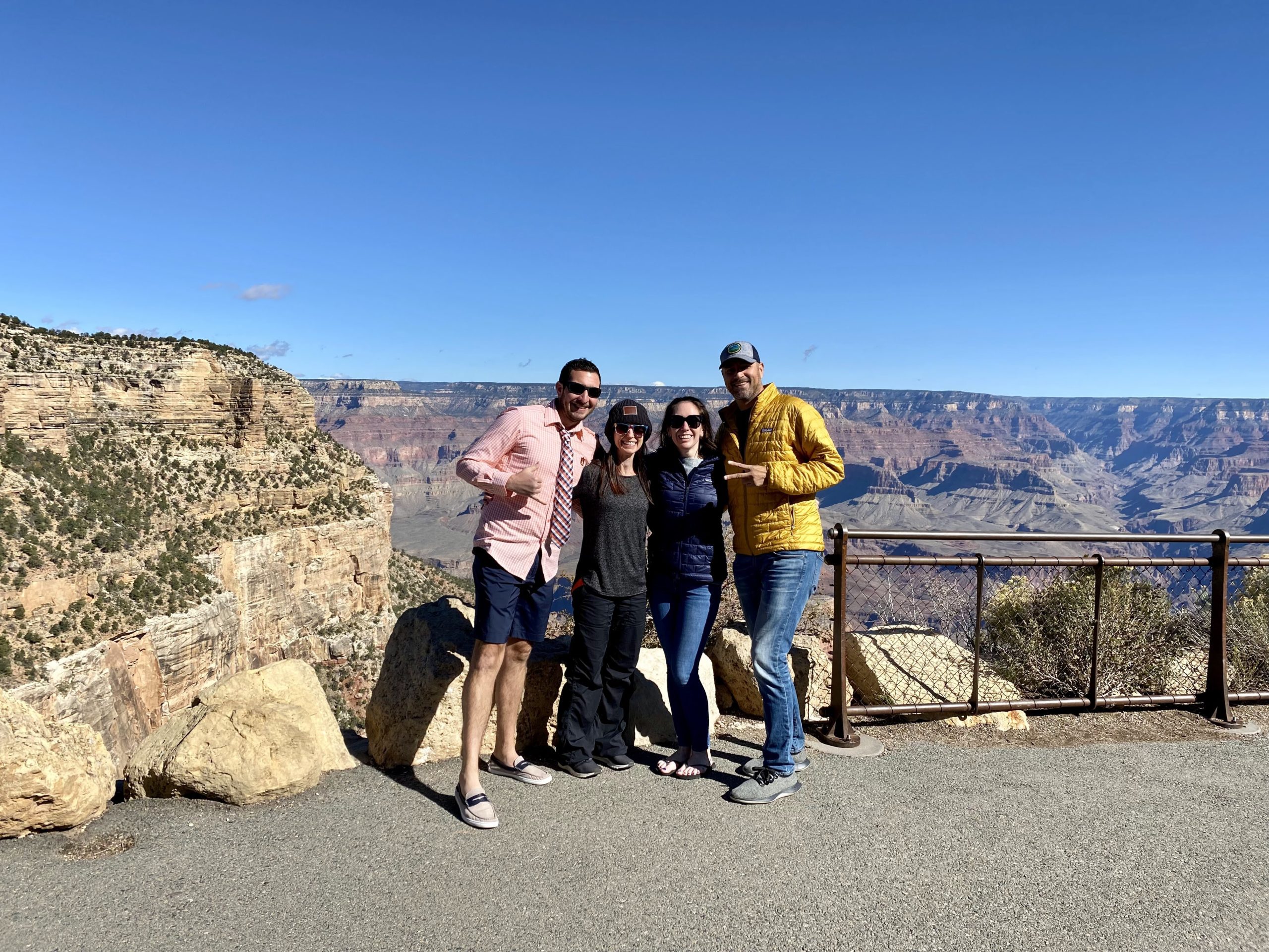 group of people on grand canyon rim
