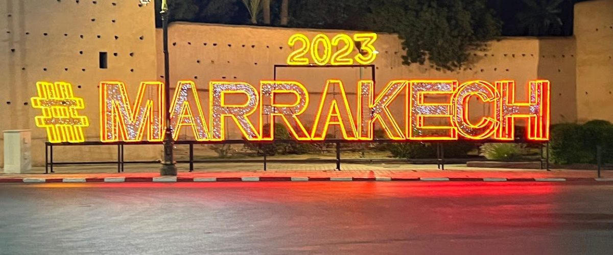 hashtag marrakech sign lit up at night