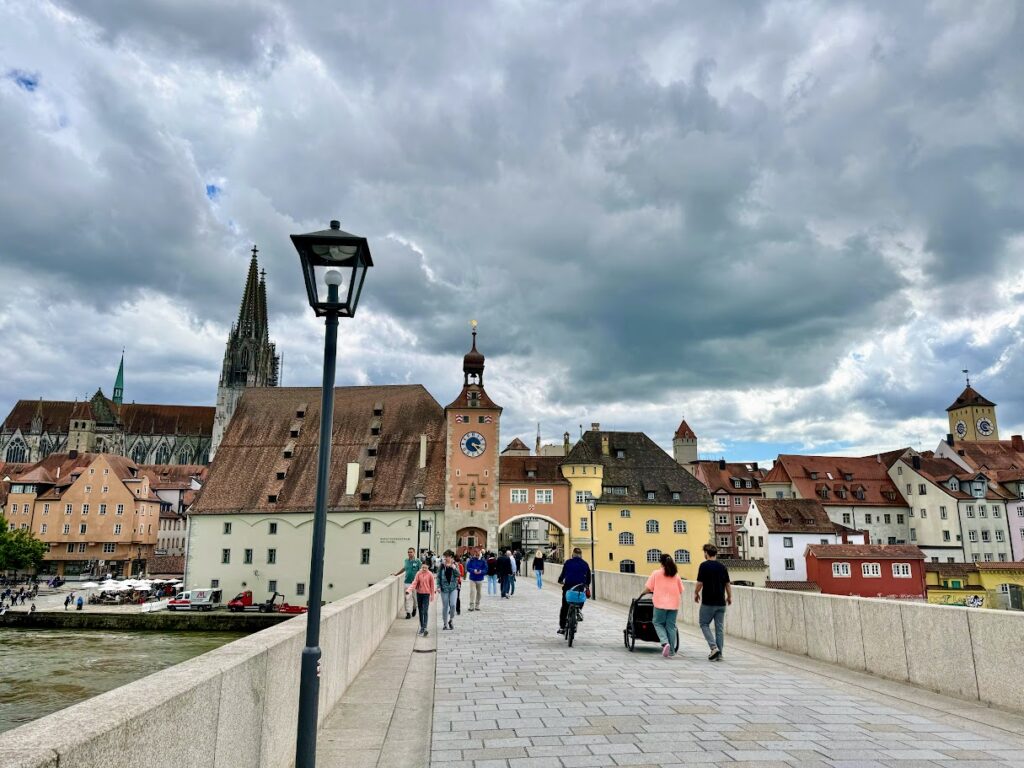 walking across the bridge in Regensburg germany